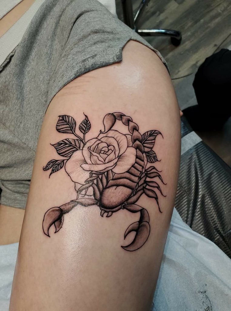 Alluring Thigh Tattoos For Scorpio Ladies