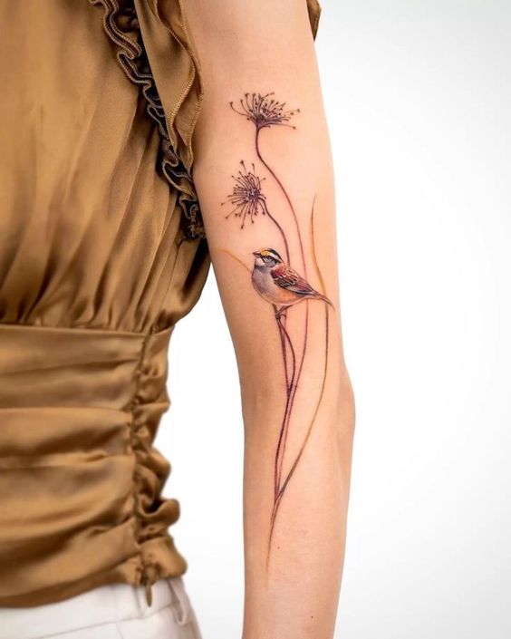 Bird With Flower Tattoos