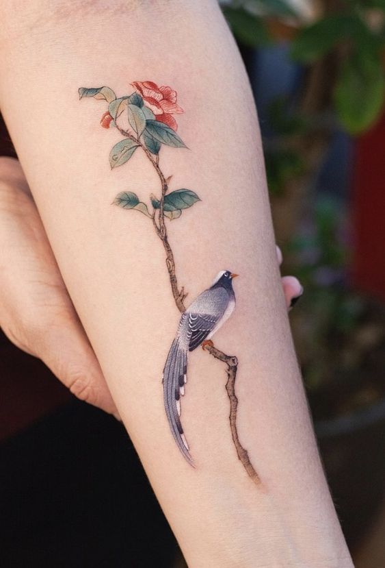 Bird With Flower Tattoos