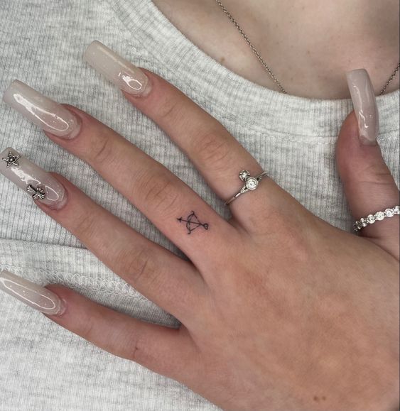 Bow And Arrow Meaningful Tiny Tattoo Ideas