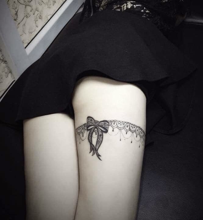 Bow Wraparound Tattoos On Thigh