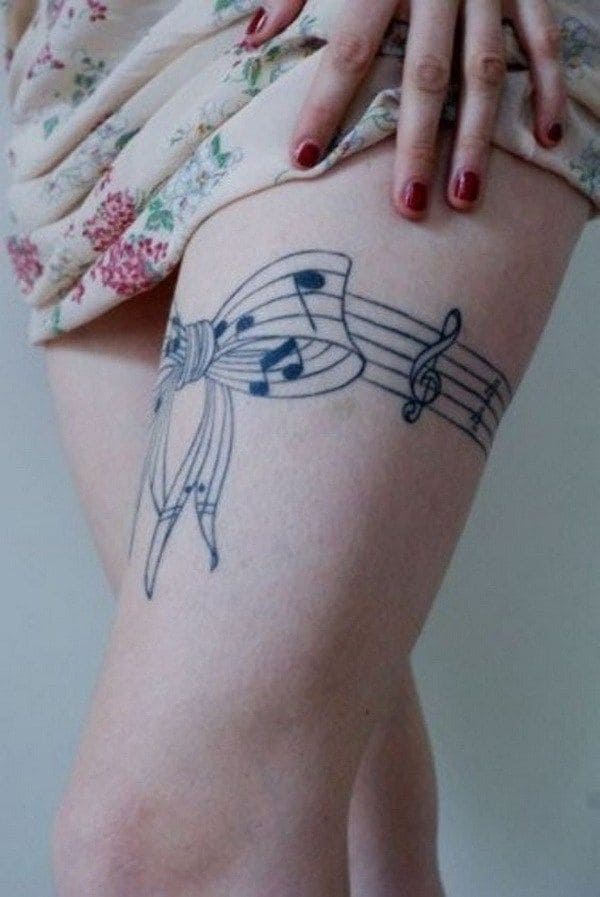  Bow Wraparound Tattoos On Thigh