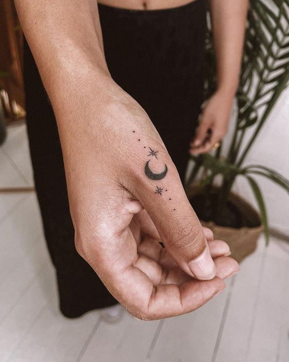  Crescent Moon And Star Finger Tattoo Designs