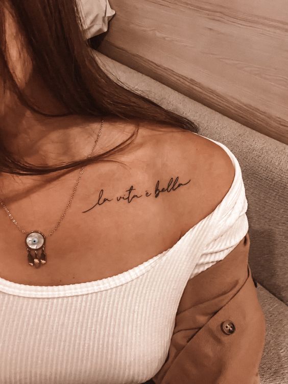 Elegant Quoted Collarbone Tattoo
