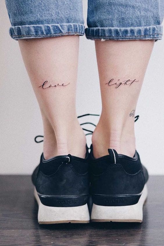 Lettering Woman Leg Tattoos