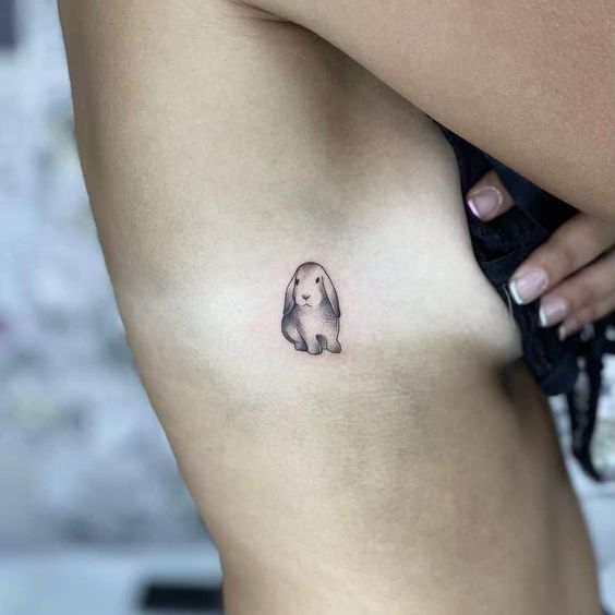 Little Animal Rib Tattoo Ideas