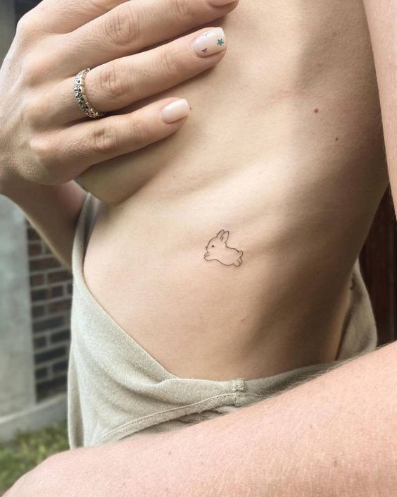 Little Animal Rib Tattoo Ideas