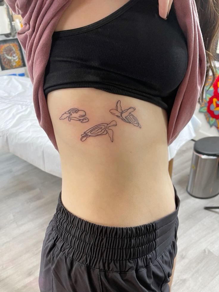Little Animal Rib Tattoo Ideas