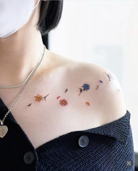 Multiple Colorful Flower Tattoos