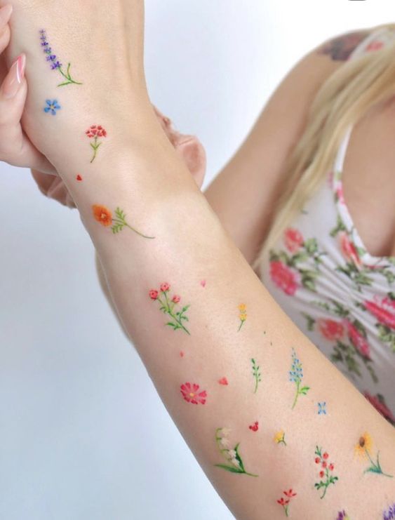 Multiple Colorful Flower Tattoos