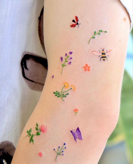 Multiple Colorful Flower Tattoos