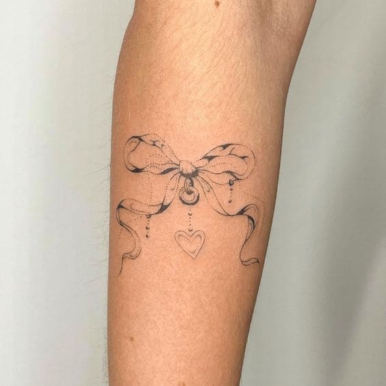  Ribbon Bow Tattoos On Arm