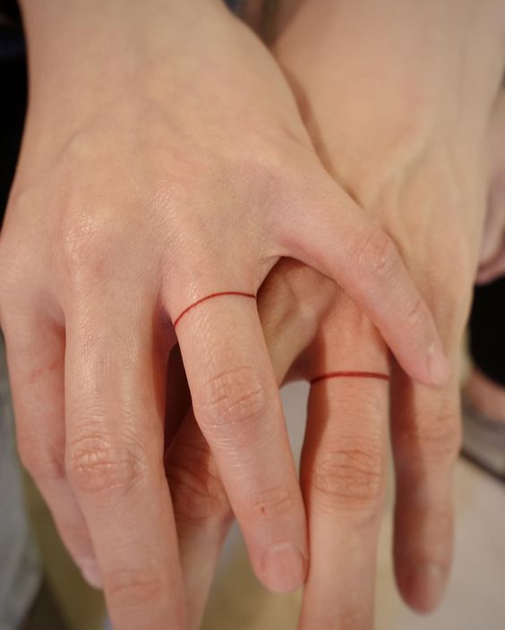  Ring Finger Tattoo Designs