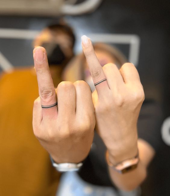  Ring Finger Tattoo Designs