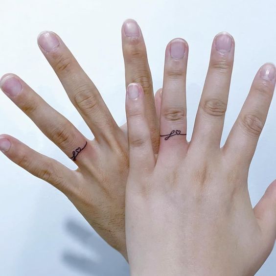  Ring Finger Tattoo Designs