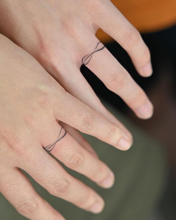  Ring Finger Tattoo Designs