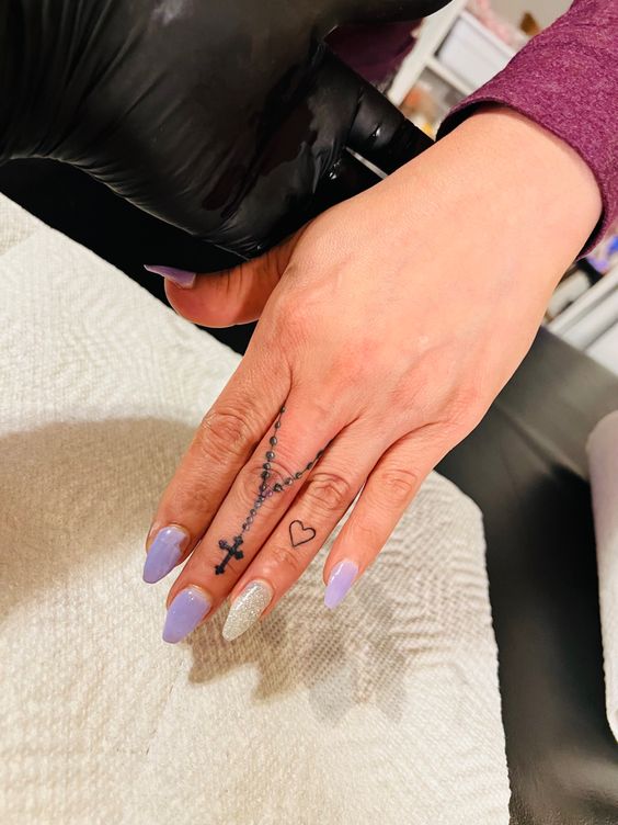 Rosary Finger Tattoos