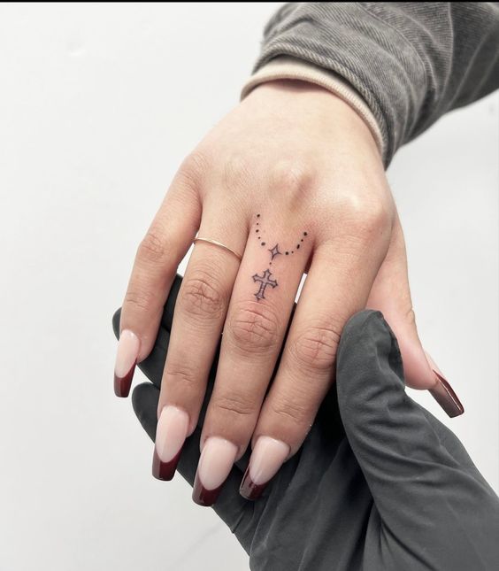 Rosary Finger Tattoos