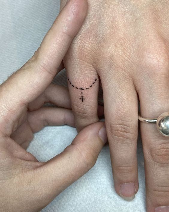 Rosary Finger Tattoos