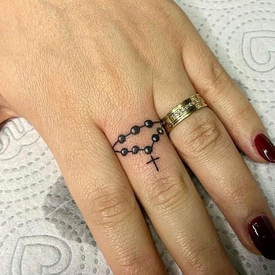 Rosary Finger Tattoos