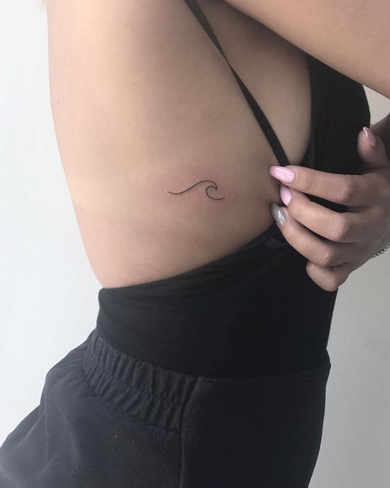 Sea Wave Tattoos On Rib