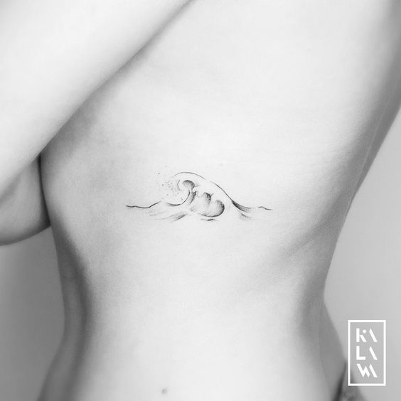 Sea Wave Tattoos On Rib