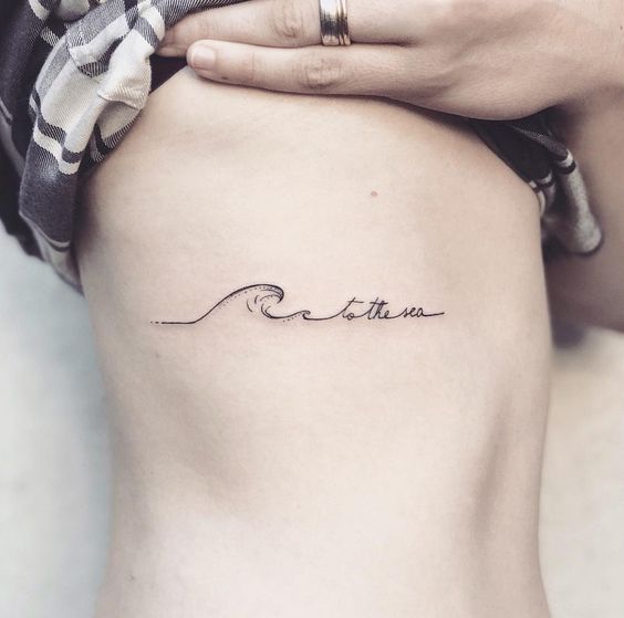 Sea Wave Tattoos On Rib