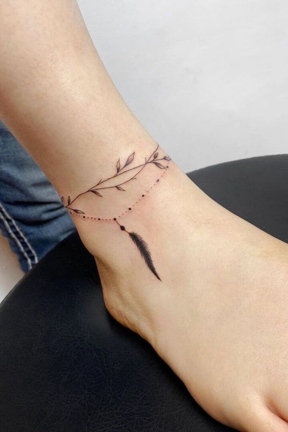 Ankle Bracelet Tattoos With Feather And Vine