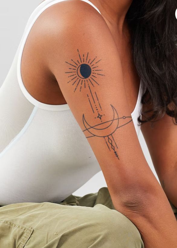 Eclipse Black Moon Arm Tattoo
