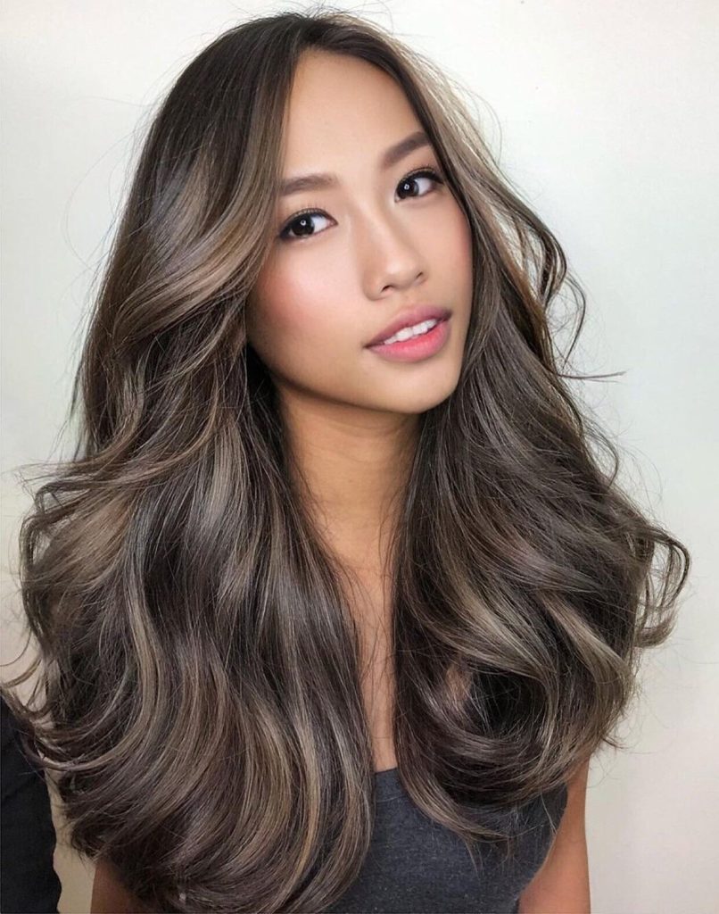 Layered Medium Haircut With Curtain Bang
