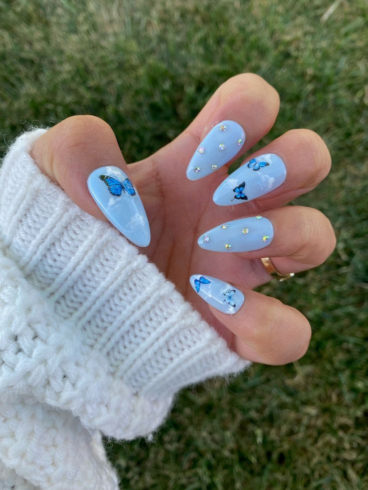 Light Blue Nails With Butterflies