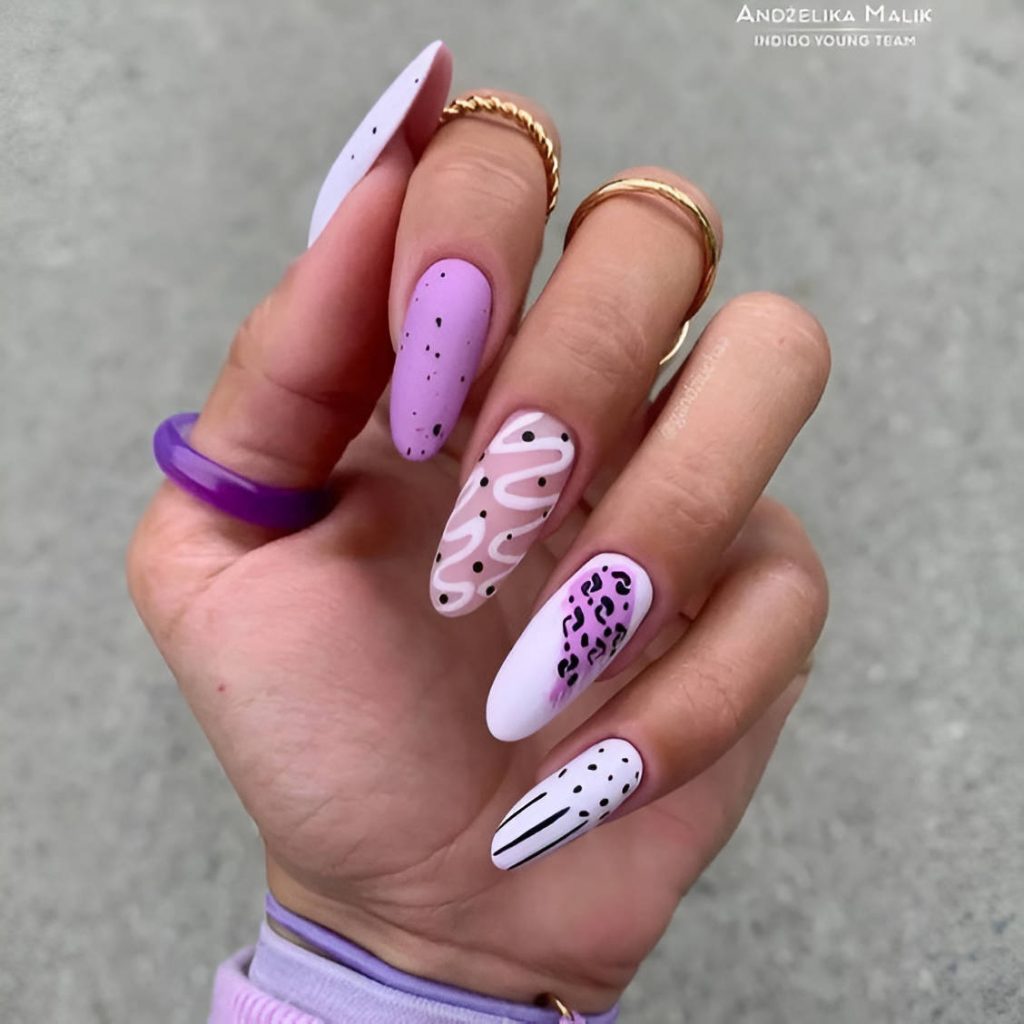  Matte Purple Manicure With Animal Patterns