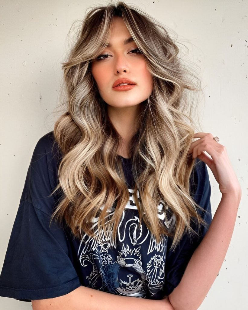 Wavy Layered Hair With Curtain Bangs